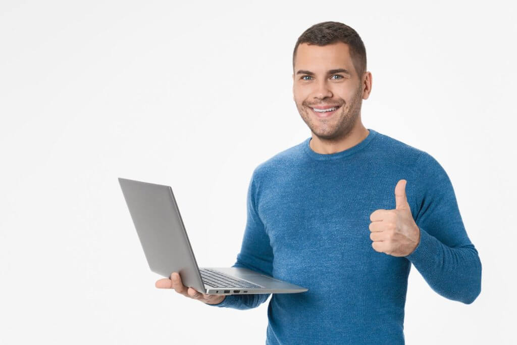 portrait-smiling-happy-man-with-laptop-thumb-up-isolated-white